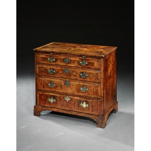 A George II burr walnut chest of drawers